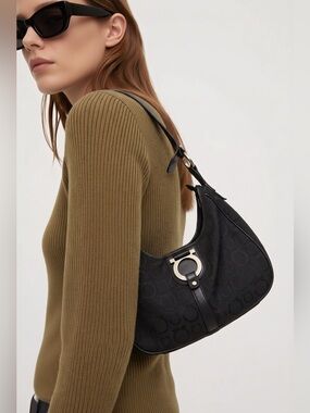 Ferragamo Black Women's logo Shoulder Bag. No call outs. Leather accents.